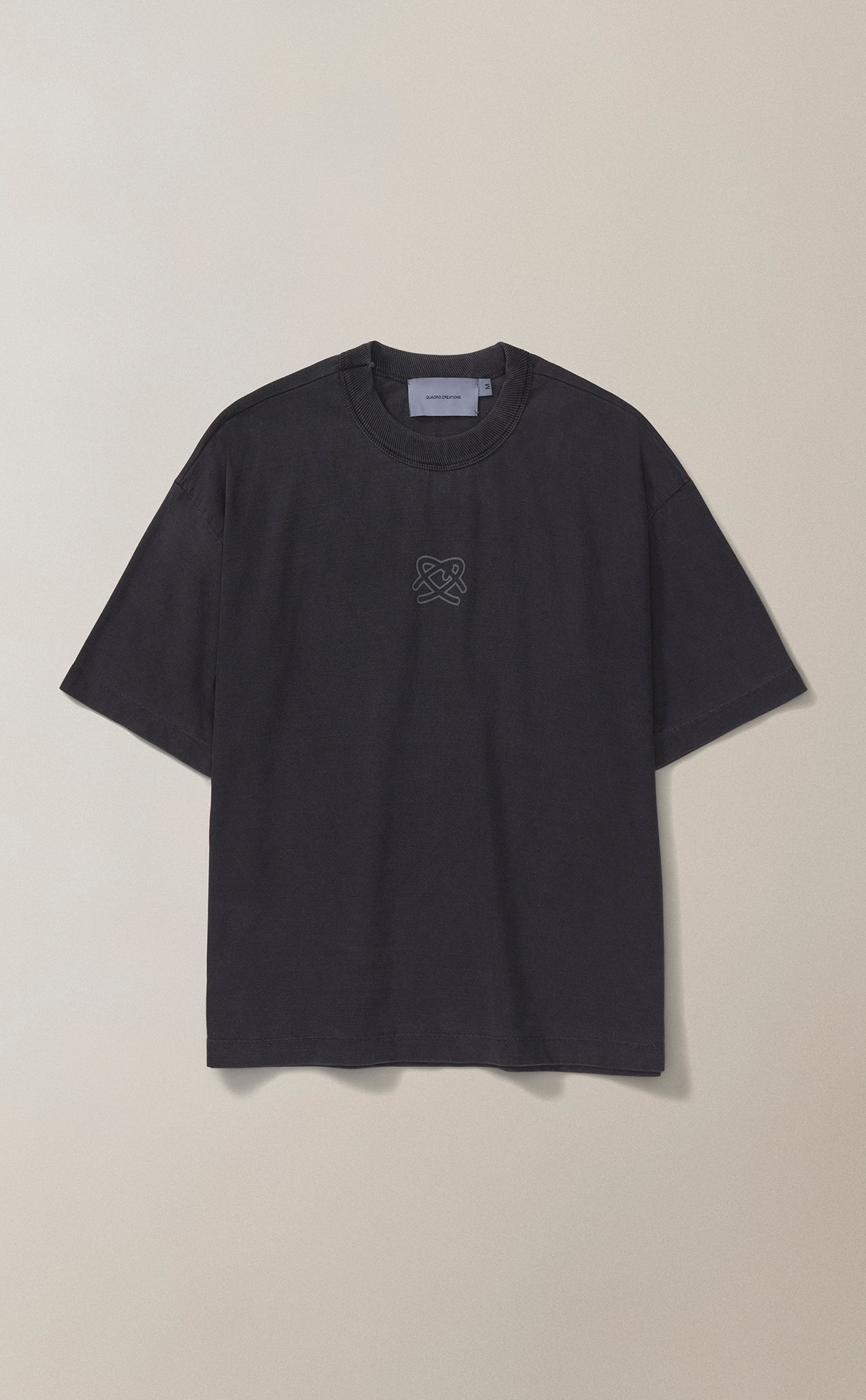 CAMISETA QC SIMBOLO BOXY STONED PRETO