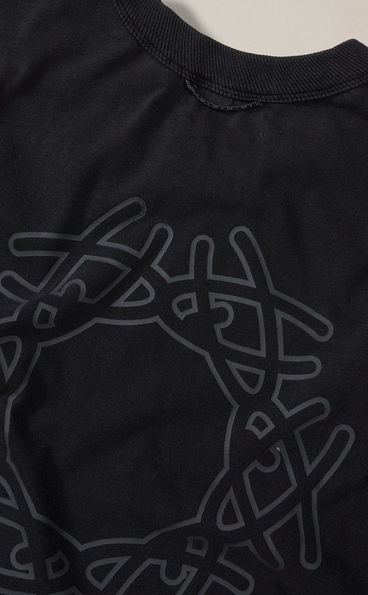 CAMISETA QC SIMBOLO BOXY STONED PRETO