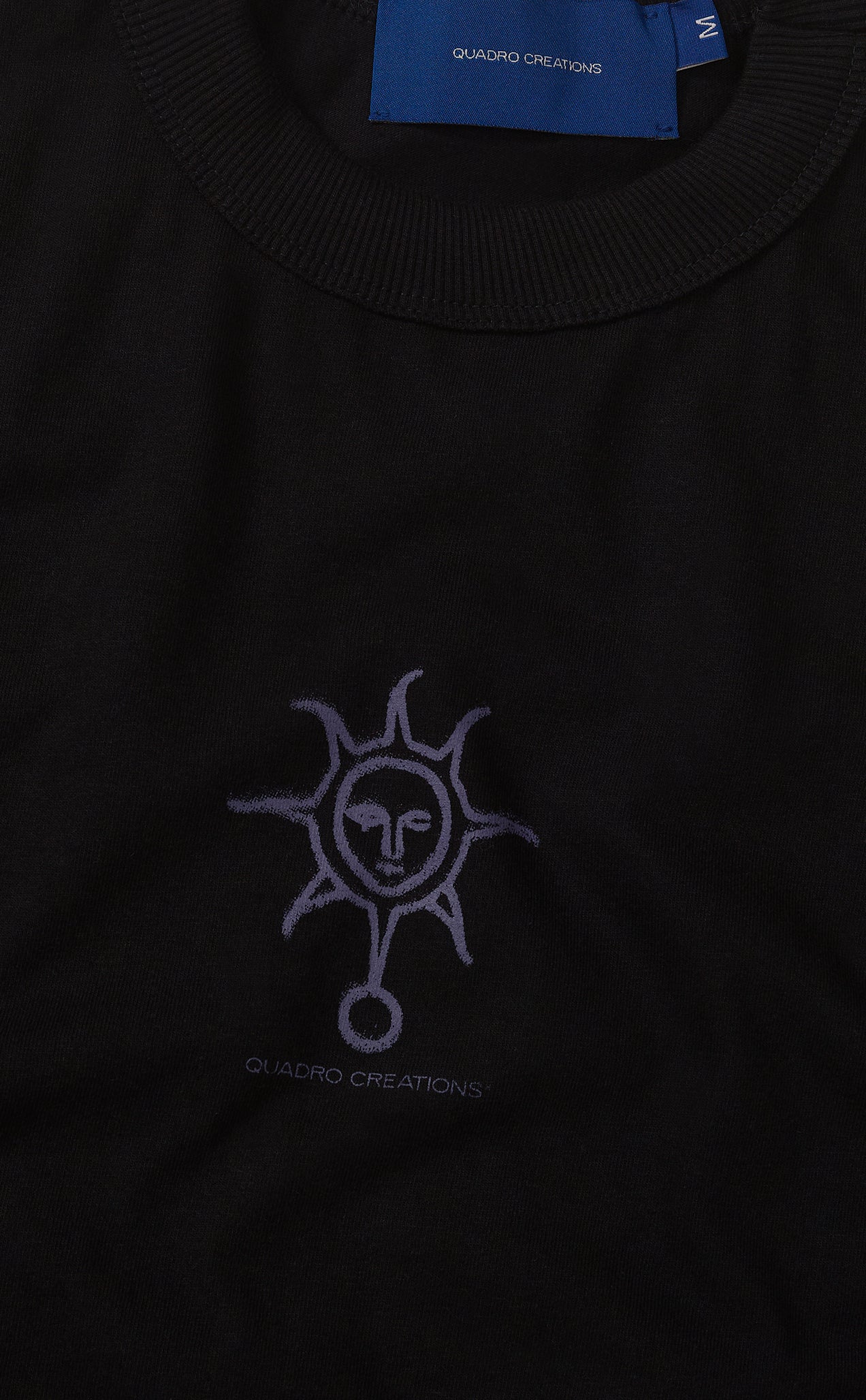 CAMISETA QC SOL EM S.A. BOXY PRETO