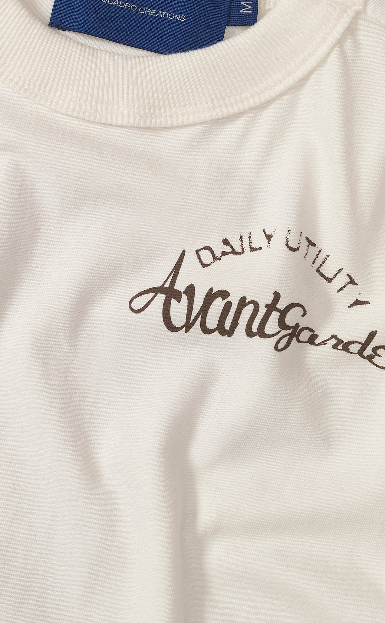 CAMISETA QC DAILY COGU BABY TEE OFF WHITE
