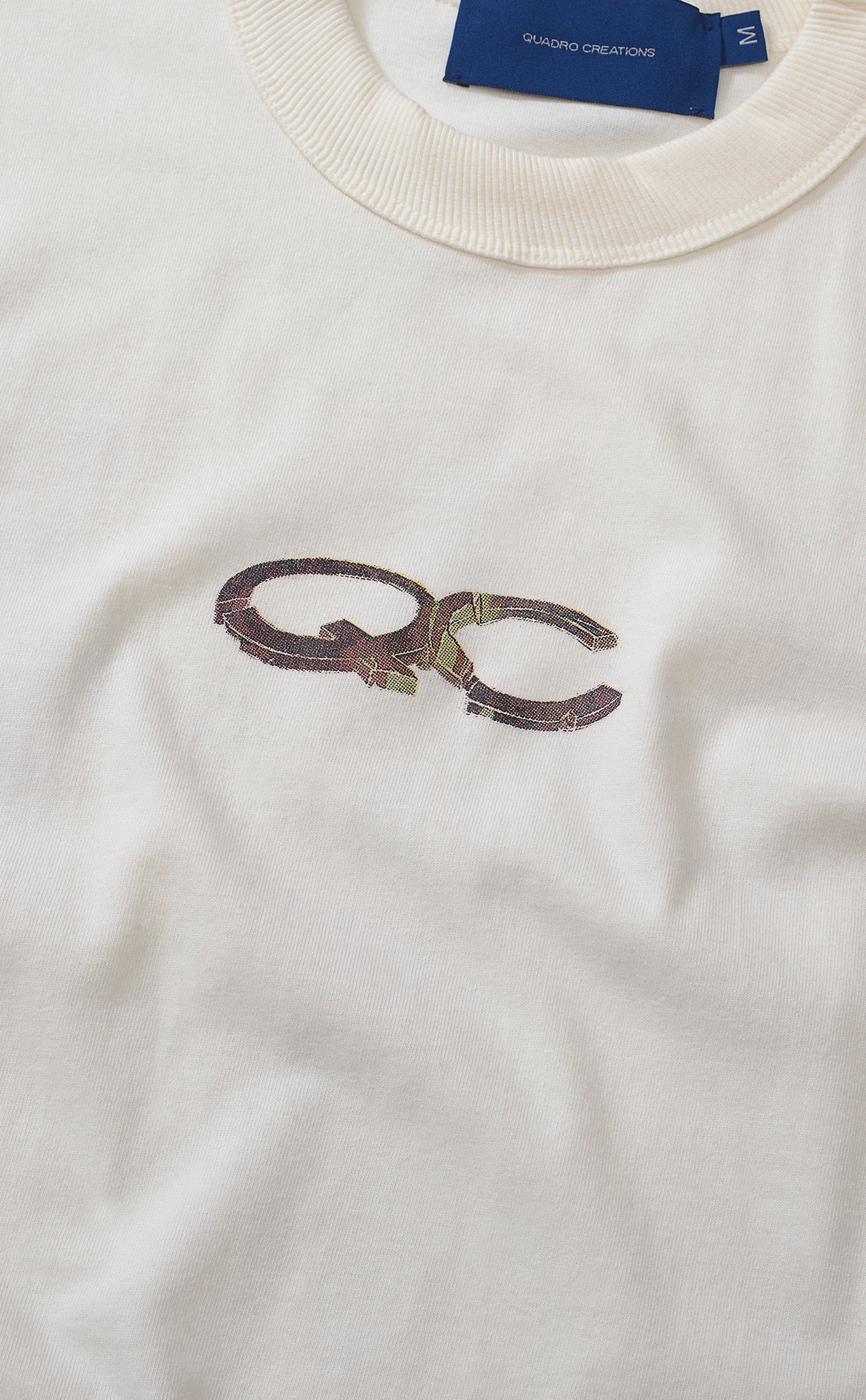CAMISETA QC AGENTES BOXY OFF WHITE