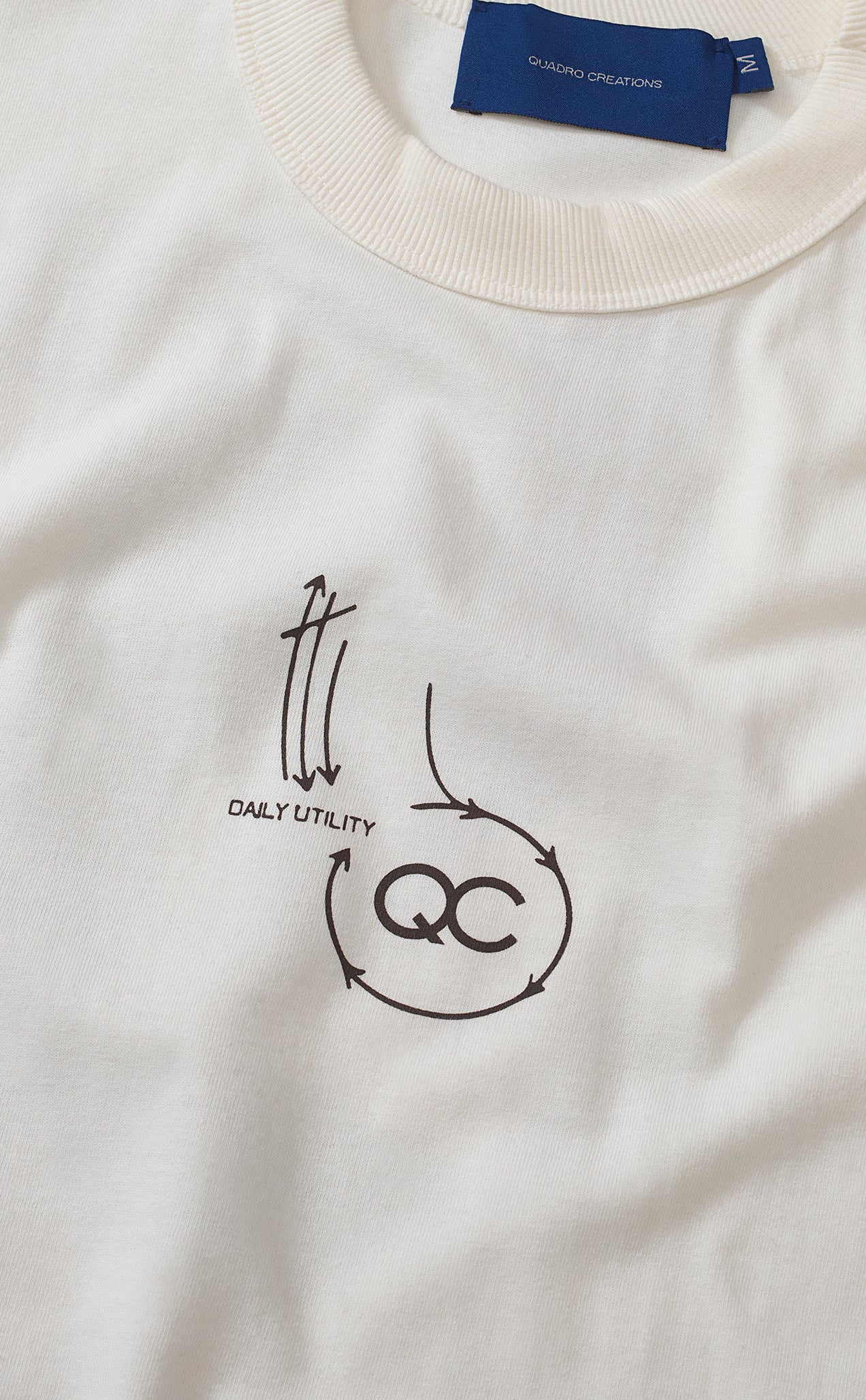 CAMISETA QC GENES BOXY OFF WHITE