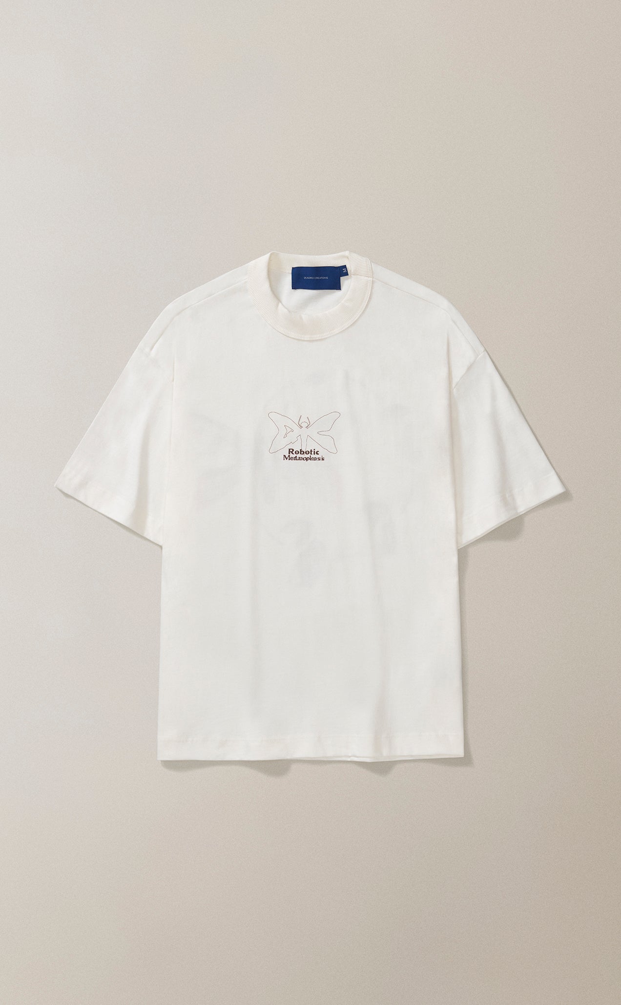 CAMISETA QC METAMORFOSE BOXY OFF WHITE