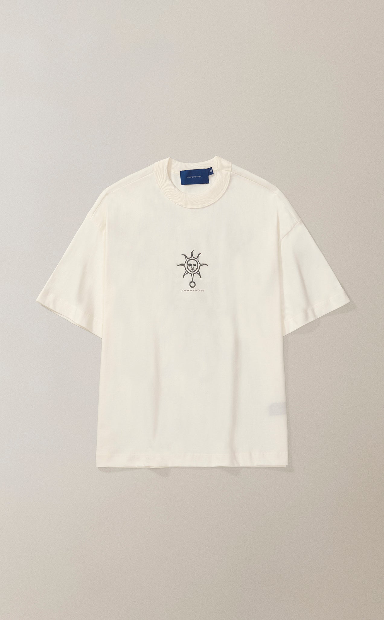 CAMISETA QC SOL EM S.A. BOXY OFF WHITE